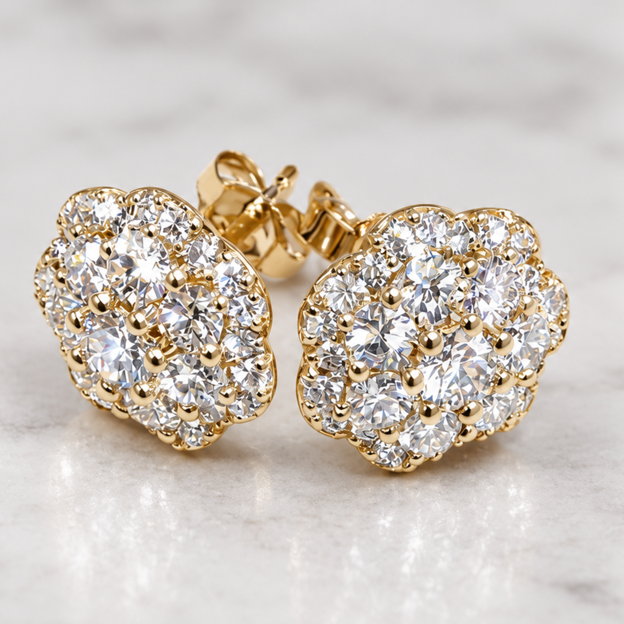 Gold earrings set with bright clear stones